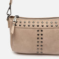 Kalani small crossbody bag with metal details 