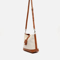 Sora bolso estilo hobo en polipiel y efecto rafia 