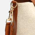 Sora bolso estilo hobo en polipiel y efecto rafia 