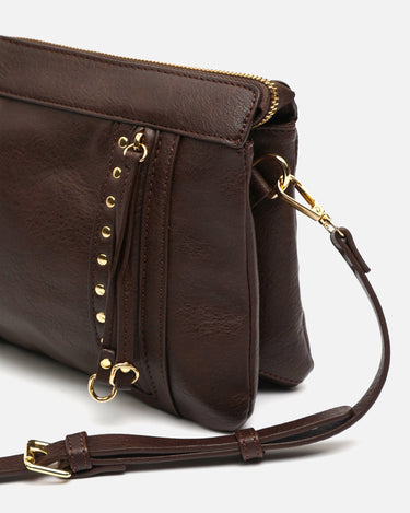 Nikasi bolso bandolera con bolsillos frontales y detalles metálicos 