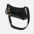 Esteri bolso bandolera pequeño con flecos y detalles metálicos 