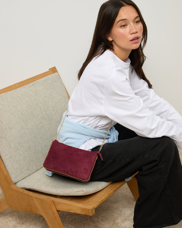 Boleo bolso bandolera efecto ante y con detalles metálicos